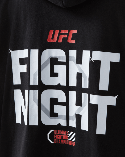 UFC DudeRobe in black featuring 'FIGHT NIGHT' graphic for ultimate comfort, perfect for UFC merch enthusiasts.