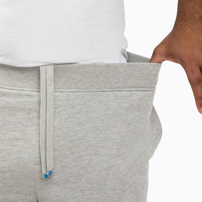 The Pants with relaxed leg holes and deep pockets, showcasing comfort and style for active lifestyles.