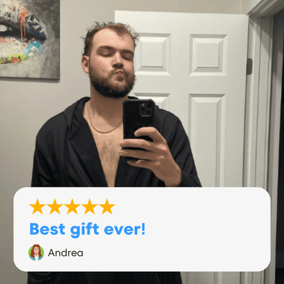 Customer wearing The DudeRobe, a mens hooded bathrobe, sharing a positive review: 'Best gift ever!'
