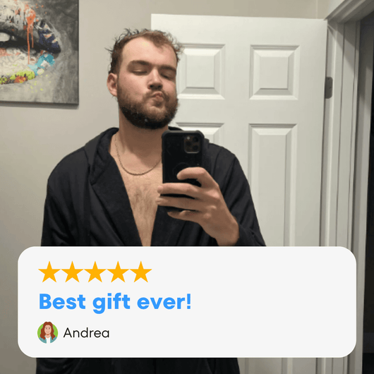 Customer wearing The DudeRobe, a mens hooded bathrobe, sharing a positive review: 'Best gift ever!'