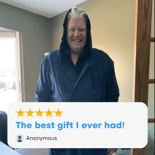 Man smiling in an All-American robe, the ideal american flag robe for relaxation and comfort.