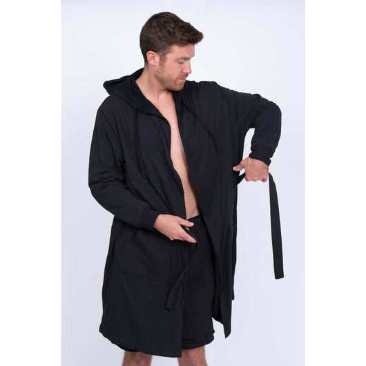 Luxury Men's Bathrobe & Shorts Combo worn by a man adjusting the tie, showing its modern and stylish design.