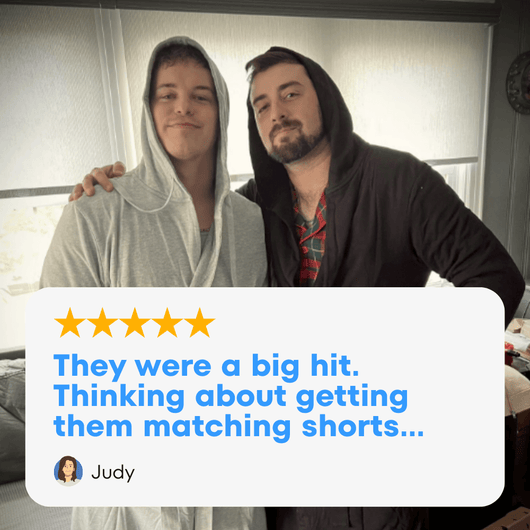 The Dad & LittleDude Duo matching robe set showcased by two happy users enjoying their cozy lounge experience.