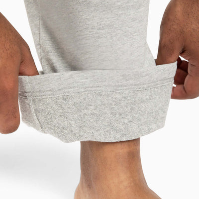 The Pants showing premium comfort waistband and relaxed leg holes in light gray color.