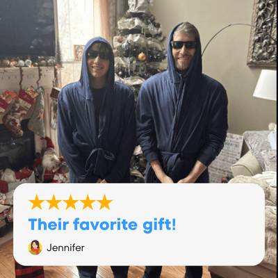 The Dad & LittleDude Duo matching robes showcased by a dad and child in cozy hooded bathrobes.