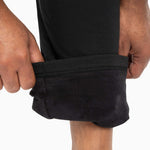 Close-up of The Pants, men's sweatpants with a soft towel lining and relaxed leg holes for comfort and easy wear.