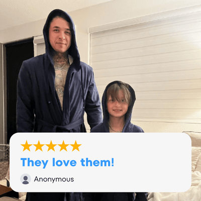 Father and child wearing matching robes, showcasing comfort and style with the American flag robe.