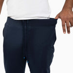 The Pants showcasing comfortable waistband and pockets in men's sweatpants, ideal for gym, beach, and relaxation.