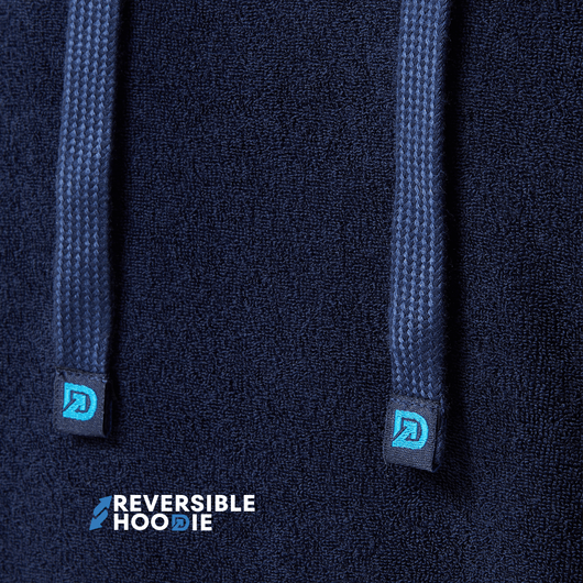 Close-up of the Reversible DudeHoodie showing the drawstrings and logo, featuring a reversible hoodie for men style.