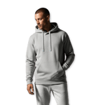 Model wearing a Reversible DudeHoodie, showcasing a modern design in grey, perfect for stylish men. Reversible hoodie for men.