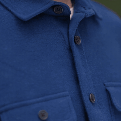 Close-up of The 1-Second Flannel, a magnetic button shirt with stylish buttons and pockets.