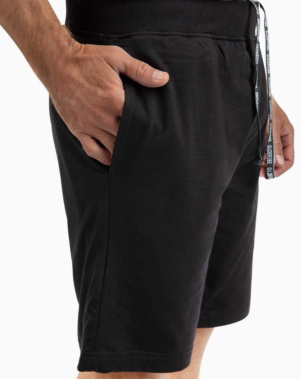 DudeShorts featuring a comfortable waistband, deep pockets, and stylish drawstrings in black fabric.