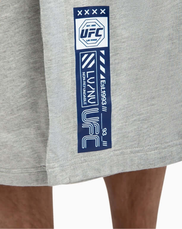 Close-up of UFC branding on DudeRobe in grey, showcasing modern design and comfort for men's loungewear.