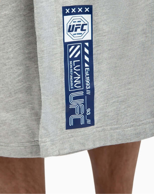 UFC DudeRobe grey close-up showing official logo and tag for authentic UFC merch.