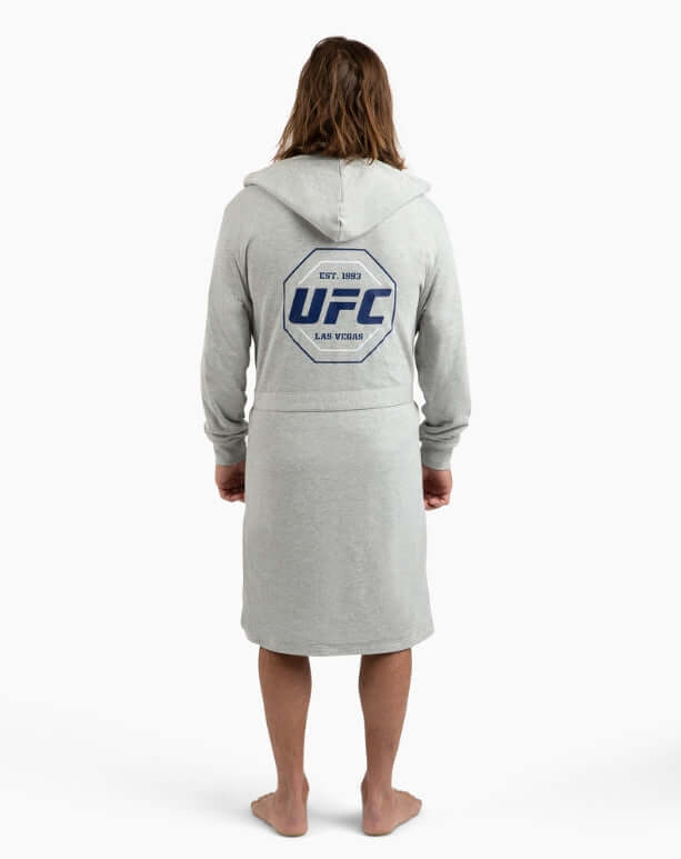Back view of a man wearing a grey UFC DudeRobe with a logo, perfect for lounging and casual wear.