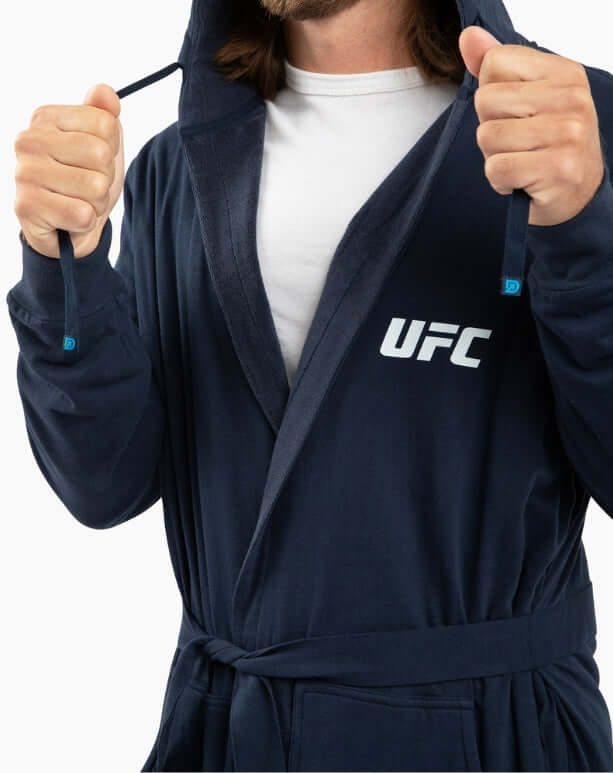 UFC DudeRobe in navy worn by a man, showcasing modern design and cozy style for lounging.